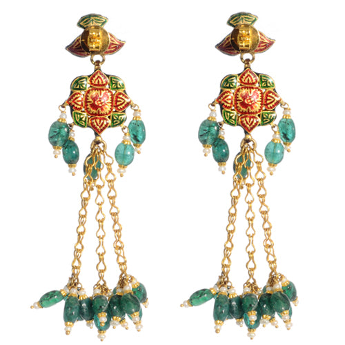 22k gold earring with uncut diamonds and emeralds.
