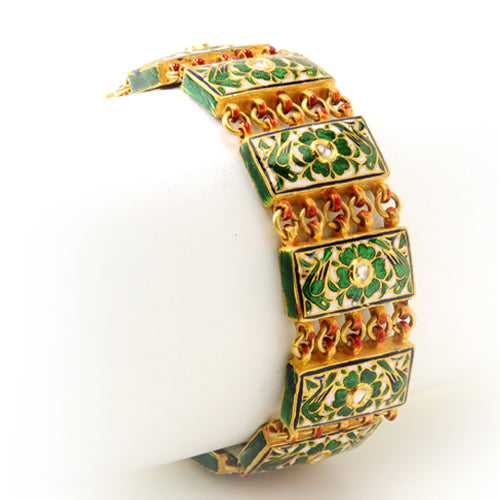 22K gold bracelet with enamel detailing and uncut diamonds