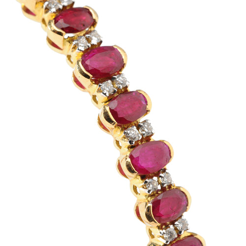 18K Gold bangle with rubies and diamonds