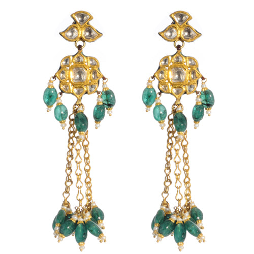 22k gold earring with uncut diamonds and emeralds.